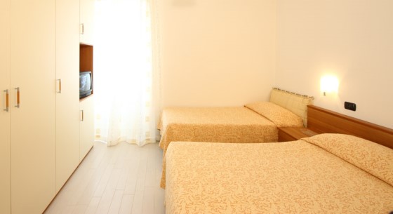 Appartement avec 2 chambres doubles et un lit simple