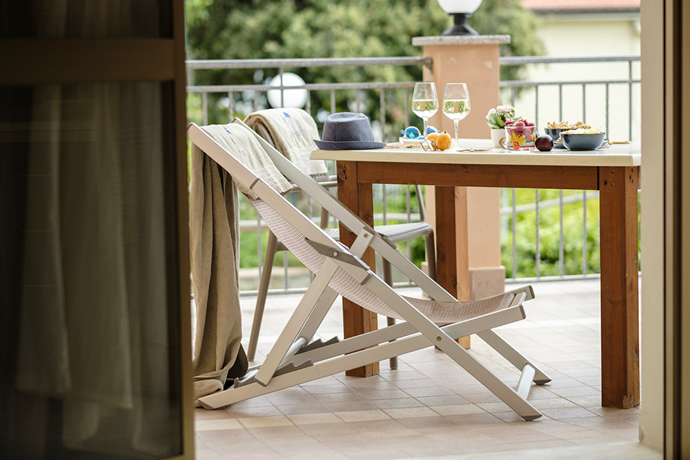 Bilocale con letto matrimoniale, letto singolo e terrazzo